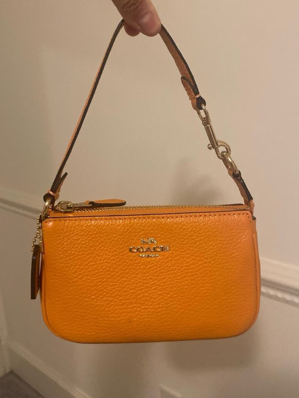 Coach Orange Pebbled Leather Wristlet with Gold Hardware